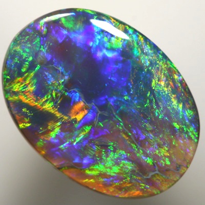 SOLID BLACK OPAL Gem quality opal with bright Golden gemmy fire  SEE VIDEO